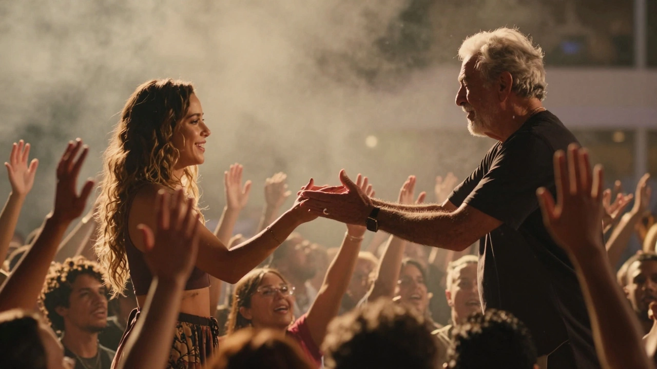 Alli Starr holds hands with an elderly fan as the crowd reaches toward her in a moment of profound connection.
