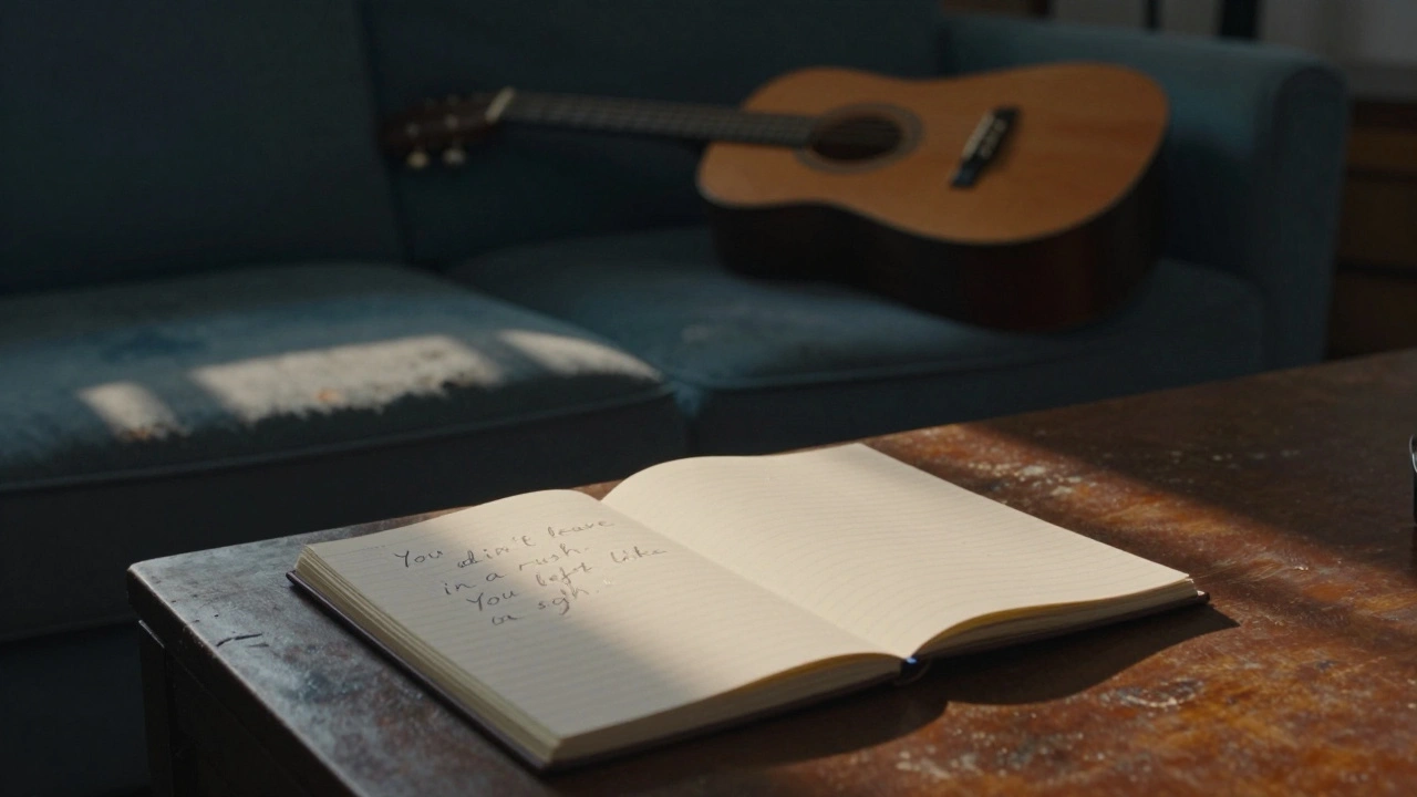 An acoustic guitar on a couch with a handwritten lyric about a sigh, illuminated by soft morning light.