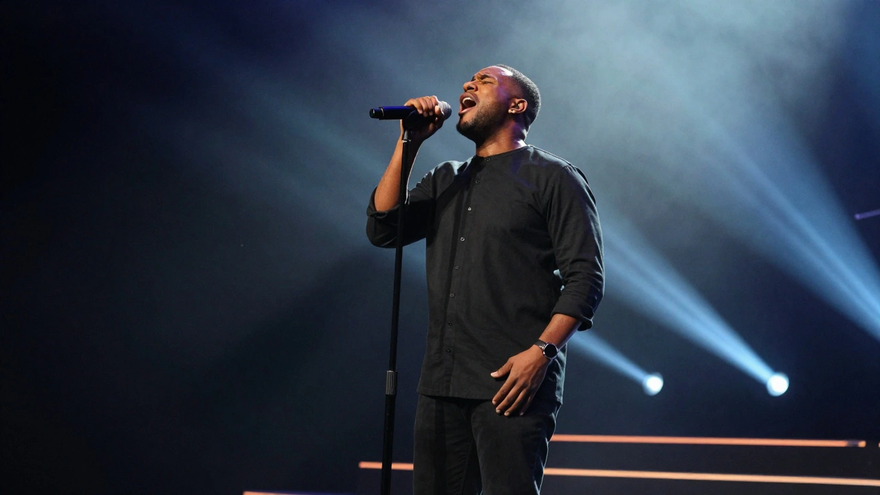 Soul singer performing a powerful high note on stage with relaxed posture and open throat.