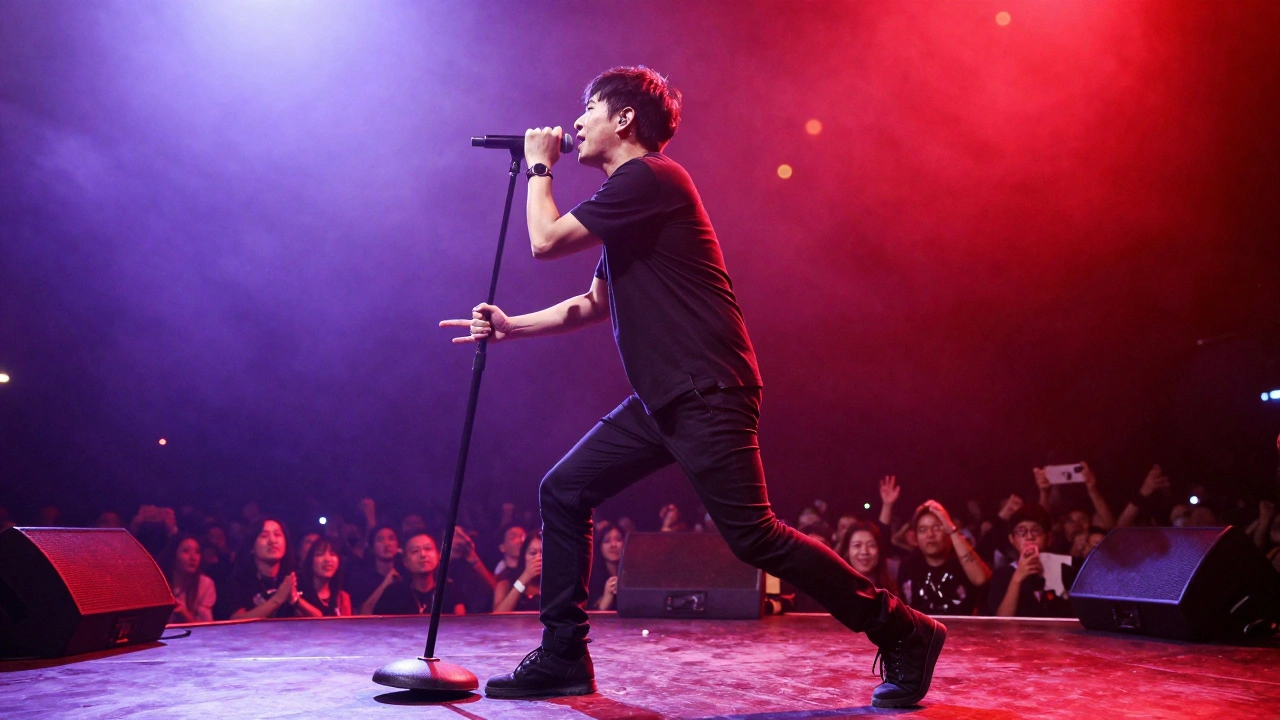 Rock singer moving dynamically across stage with intense body language.