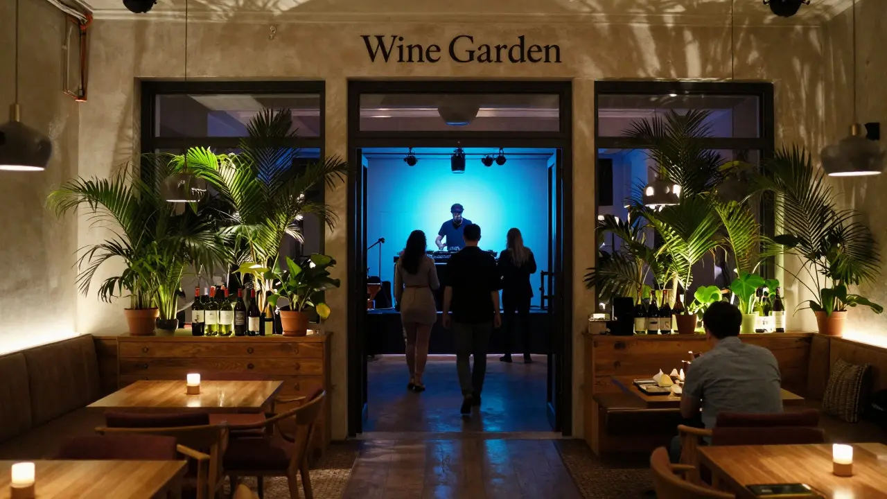 Wide view of a sophisticated lounge showing the blend of garden aesthetics and DJ performance